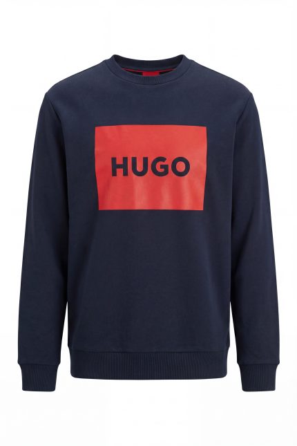 POLERA HG AZUL EN FONDO ROJO - M